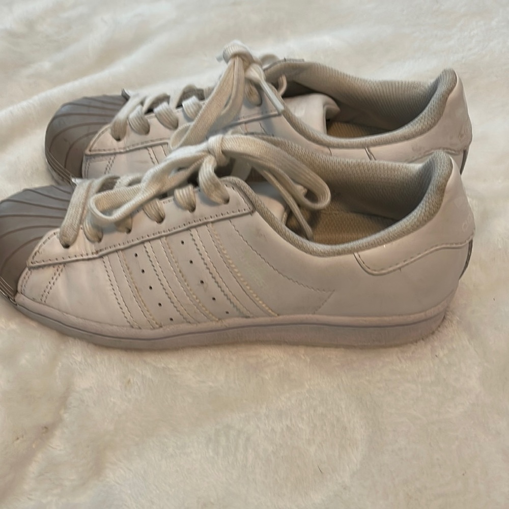 Adidas pink and white shoes